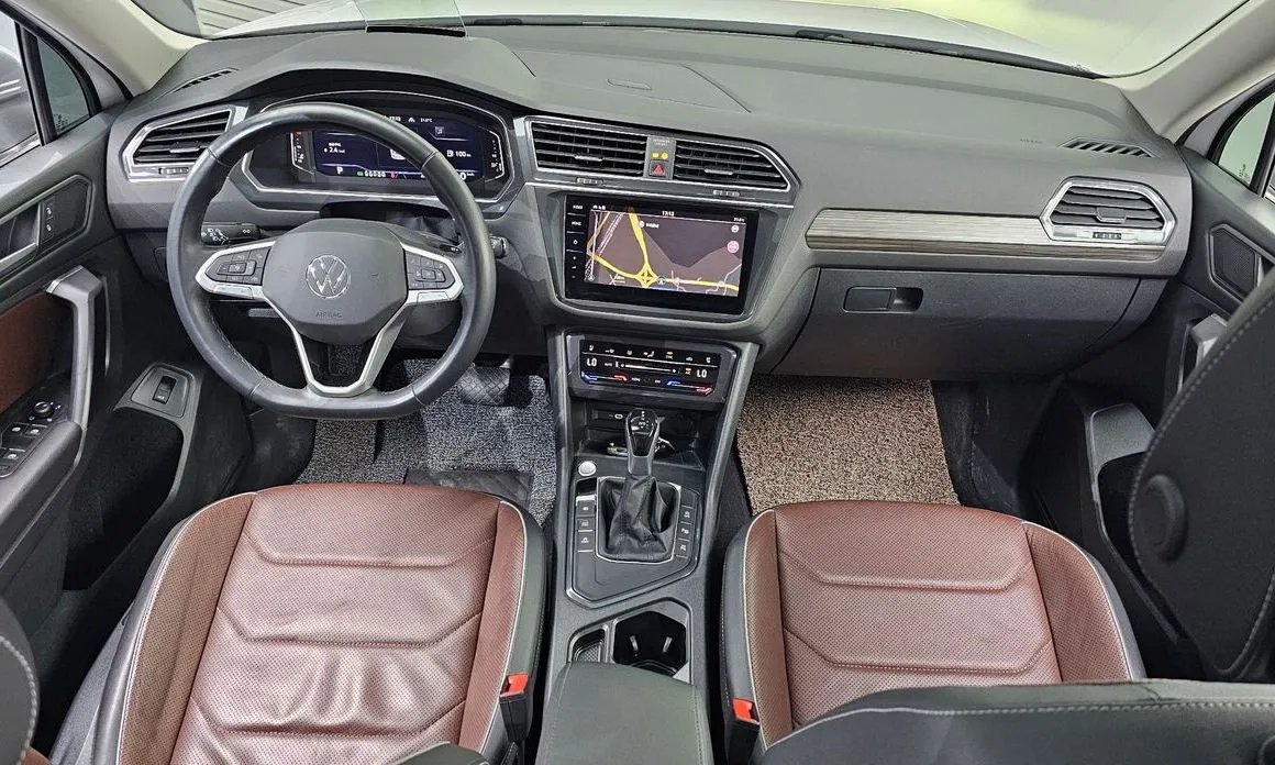 Volkswagen Tiguan — фото 10