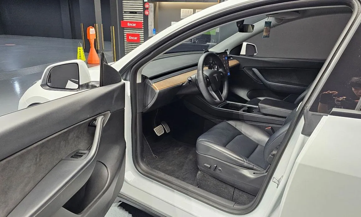 Tesla Model Y — фото 10