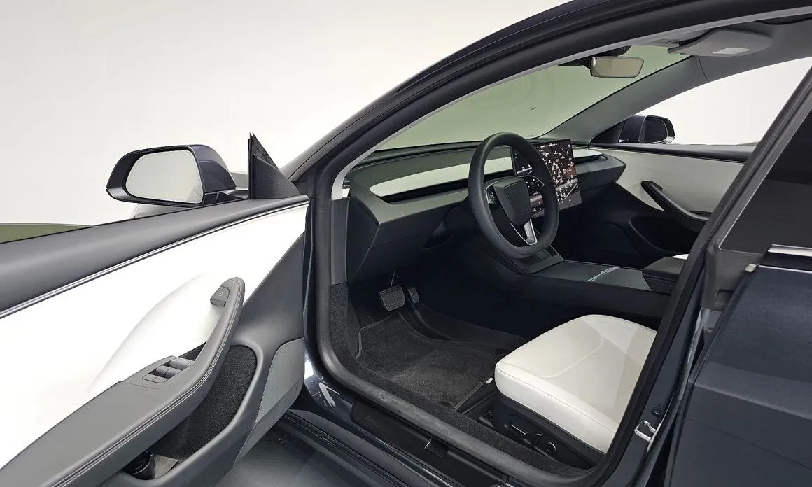 Tesla Model 3 — фото 10