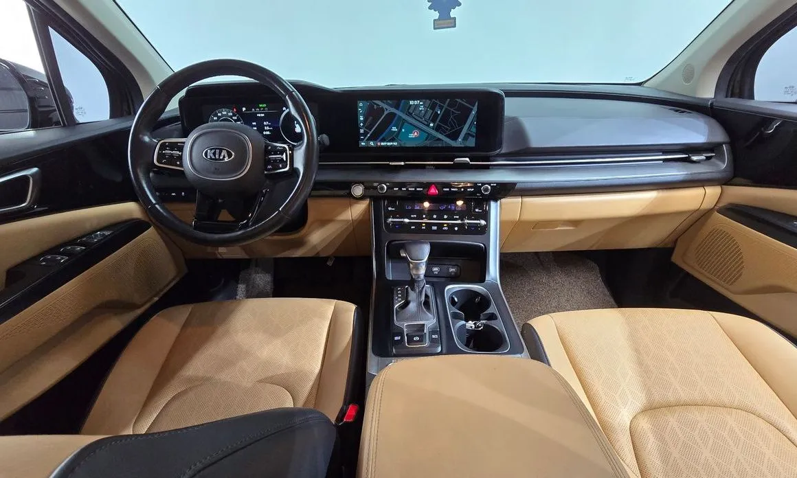 Kia Carnival — фото 10