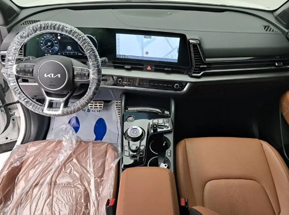 Kia Sportage — фото 10