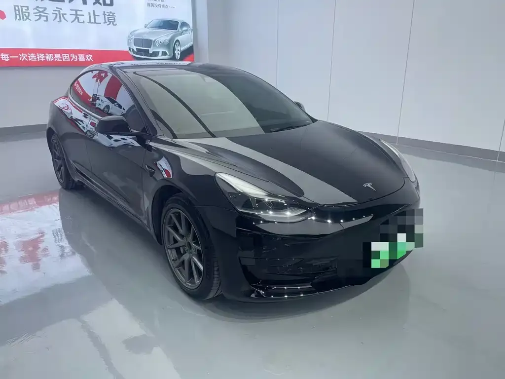 Tesla Model 3 — фото 4