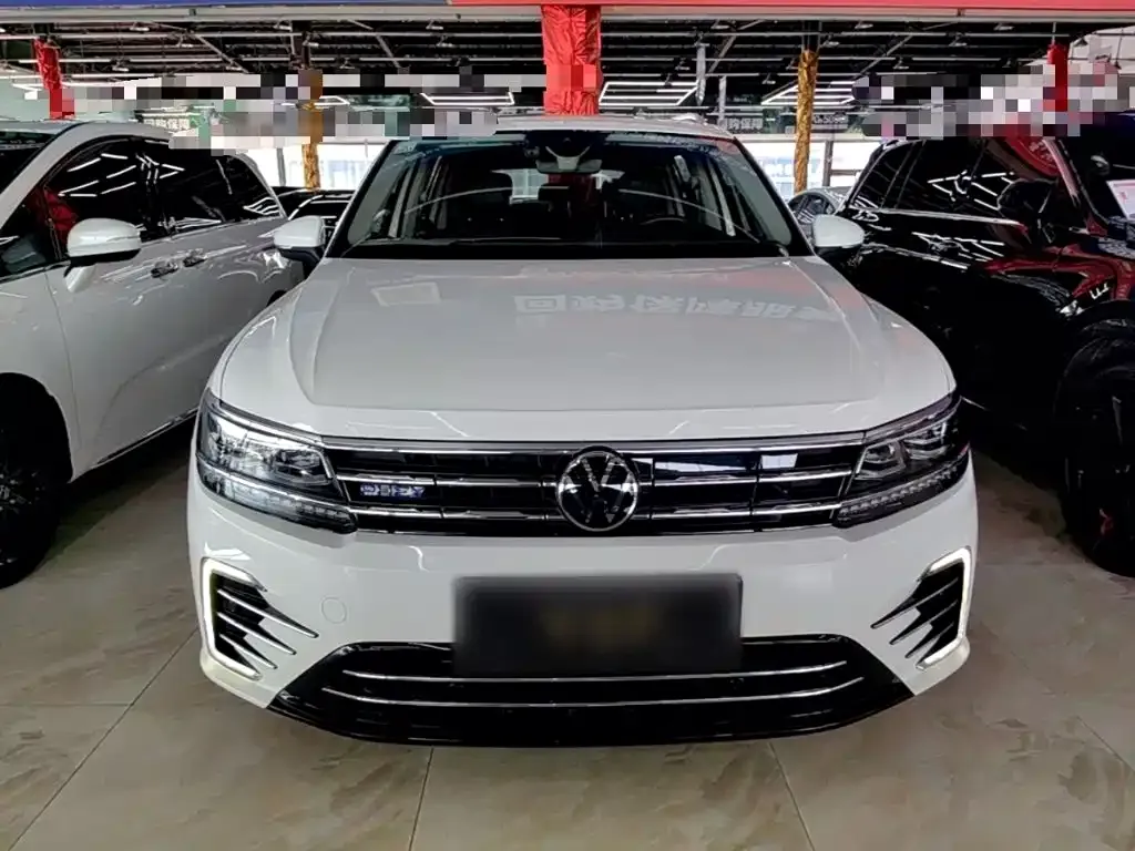 Volkswagen Tiguan L PHEV — фото 6