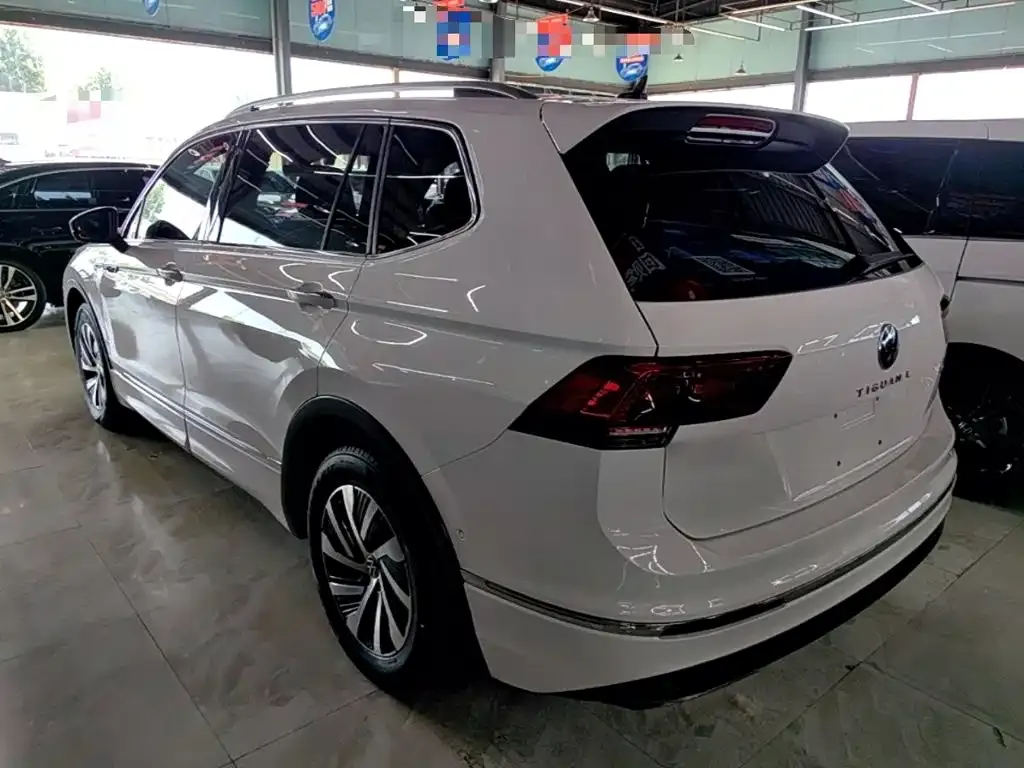 Volkswagen Tiguan L PHEV — фото 10