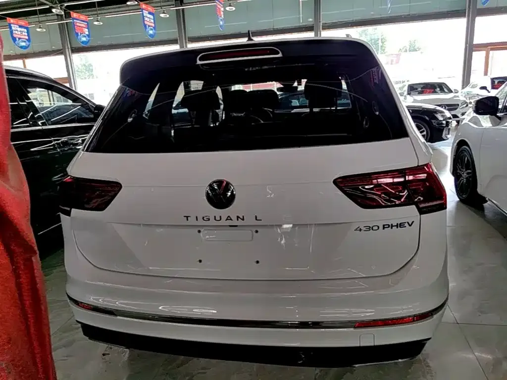 Volkswagen Tiguan L PHEV — фото 8