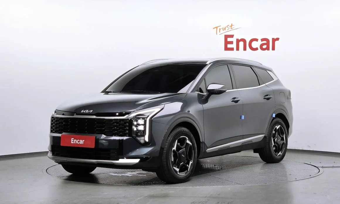 Kia Sportage — фото 1