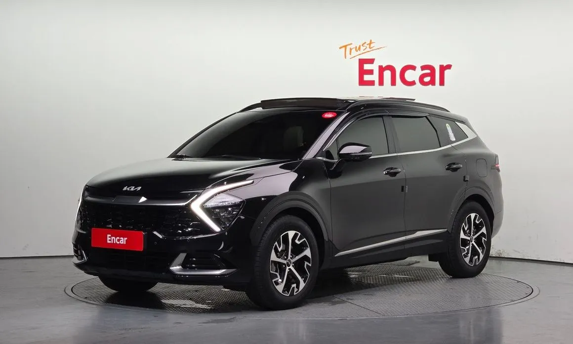 Kia Sportage — фото 1