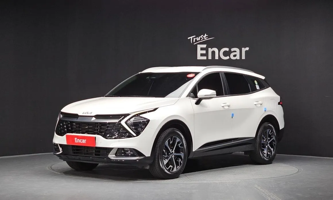 Kia Sportage — фото 1