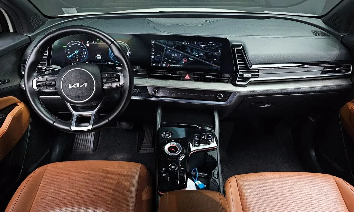 Kia Sportage — фото 9