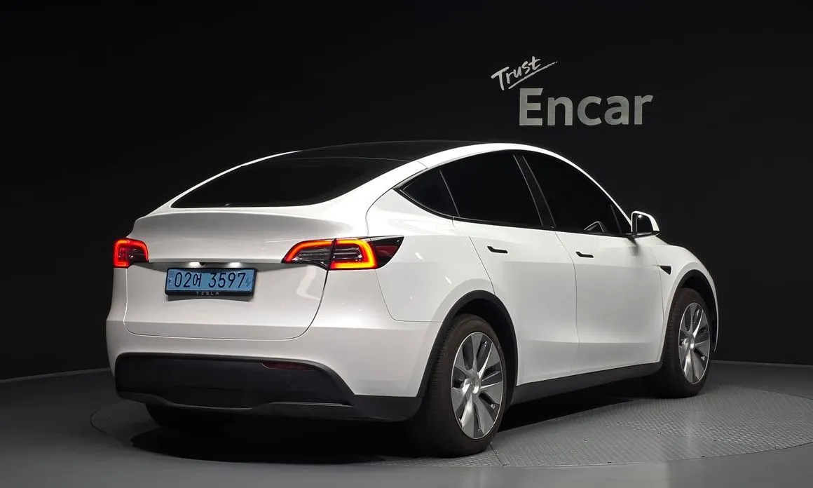 Tesla Model Y — фото 5