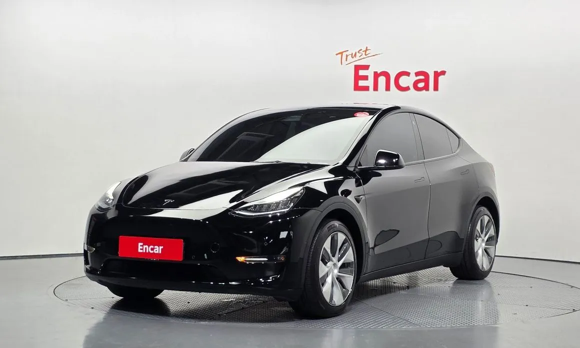Tesla Model Y — фото 1