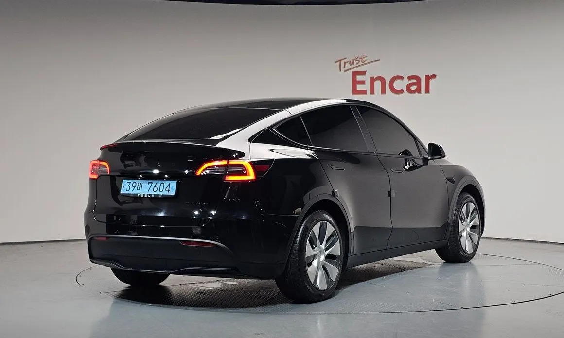 Tesla Model Y — фото 7