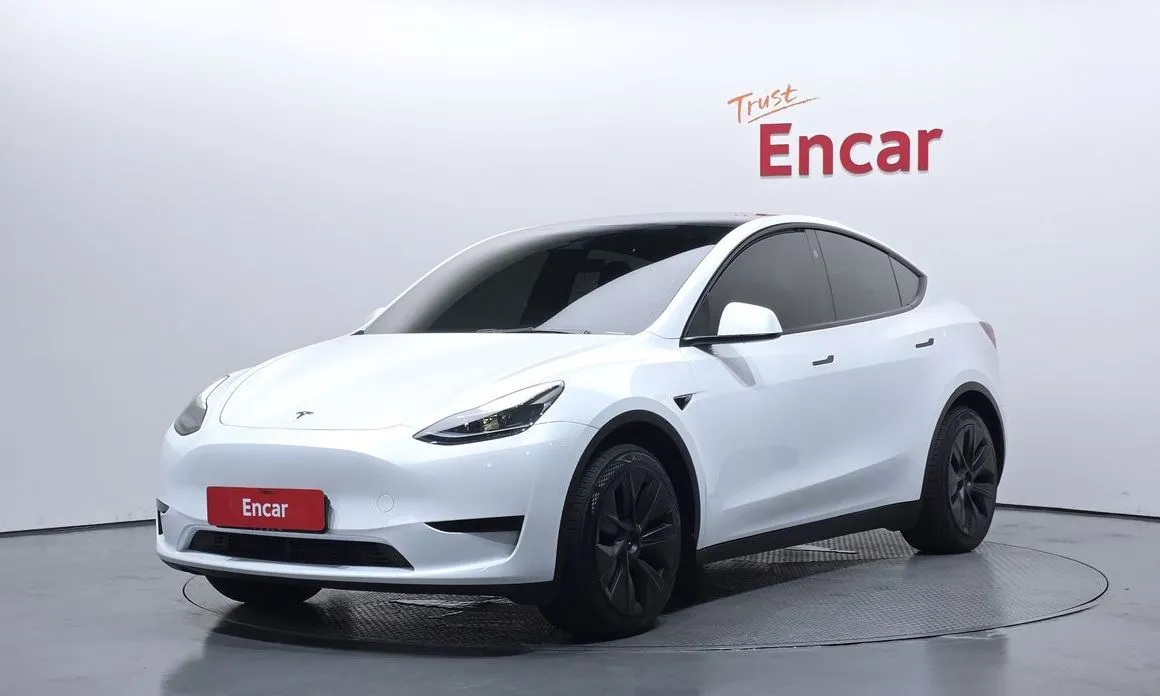 Tesla Model Y — фото 1