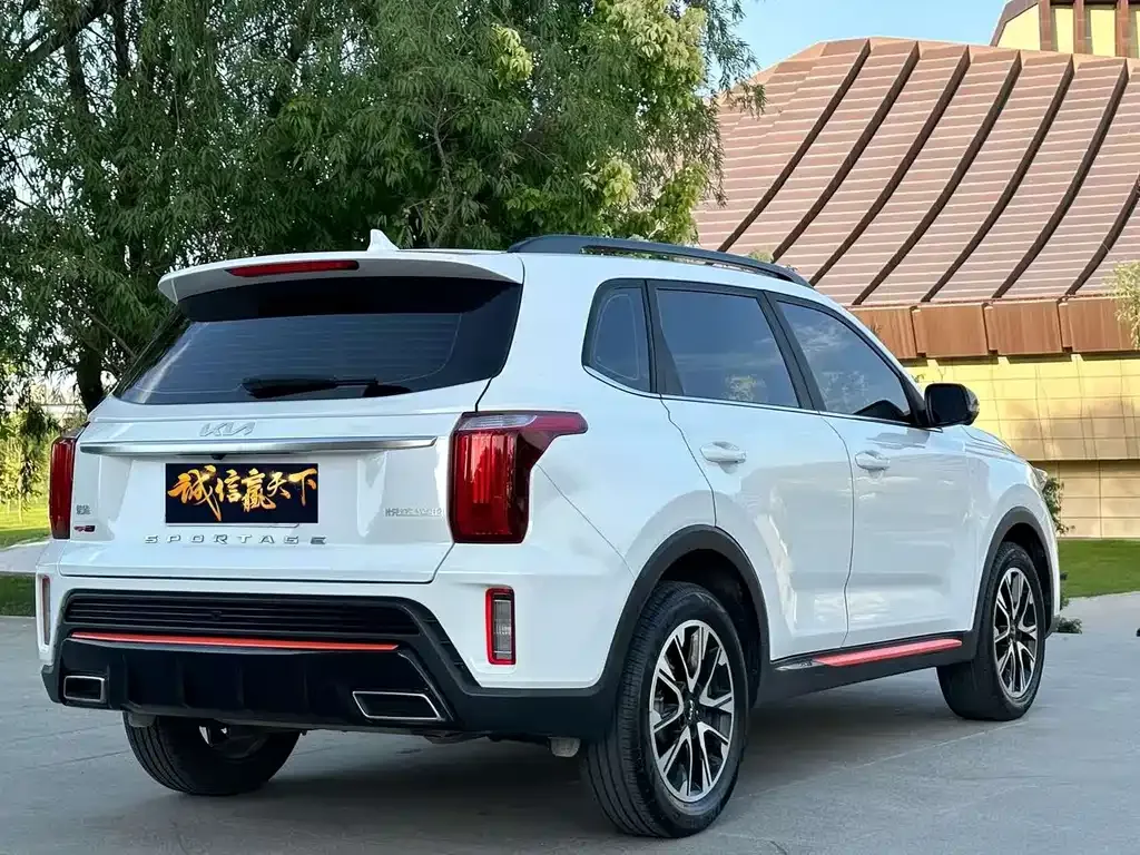 Kia Sportage — фото 7
