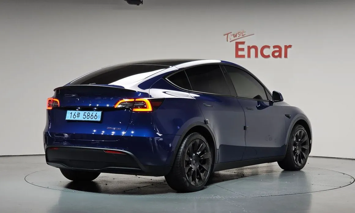 Tesla Model Y — фото 6