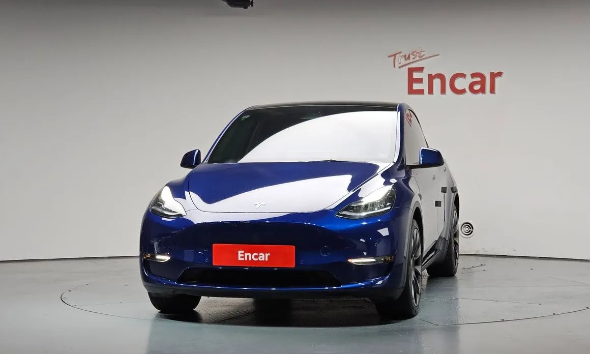 Tesla Model Y — фото 8