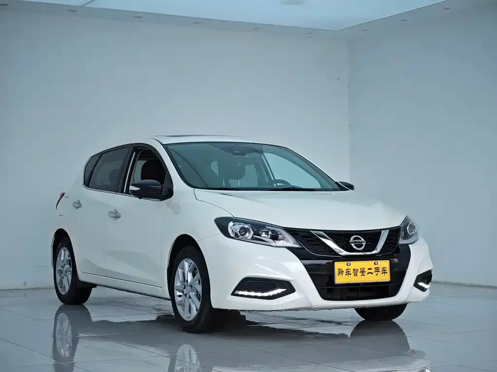 Nissan Tiida — фото 8