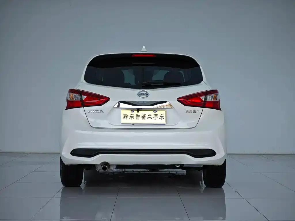 Nissan Tiida — фото 10