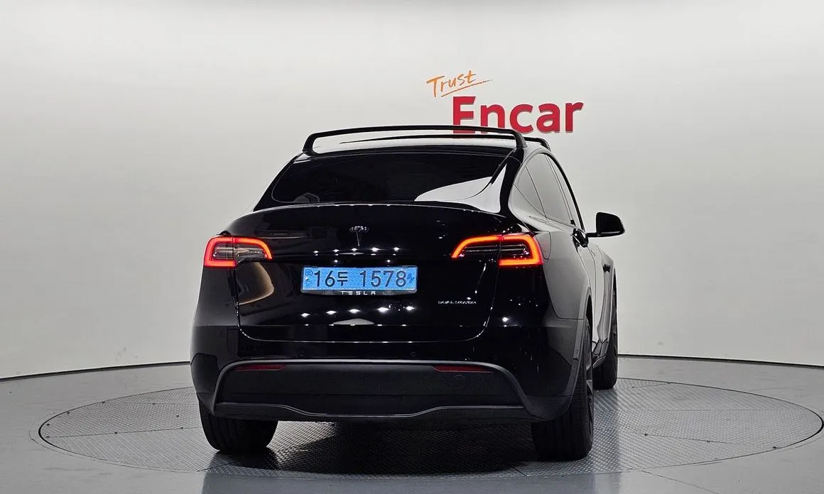 Tesla Model Y — фото 7