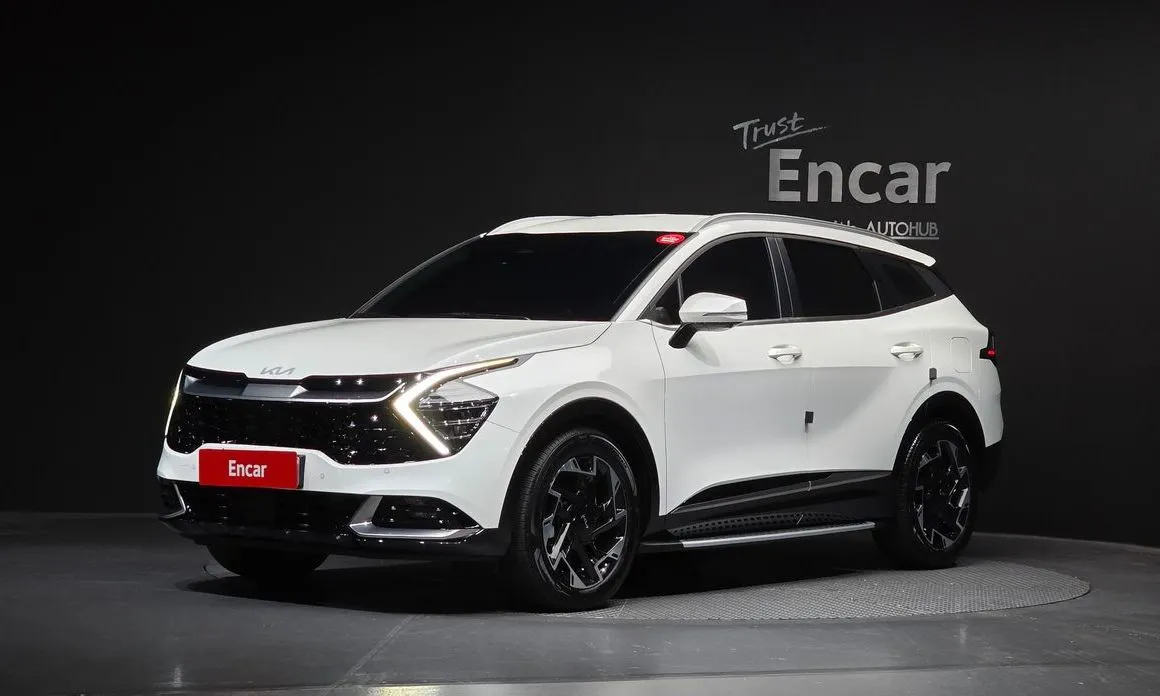 Kia Sportage — фото 1
