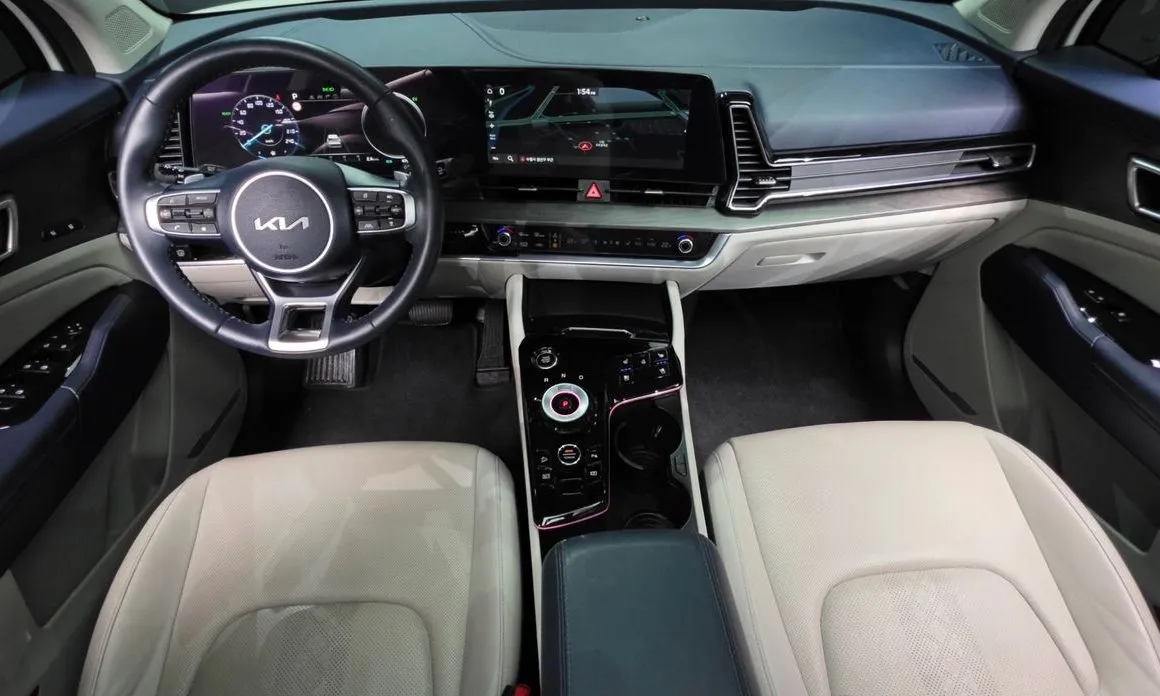 Kia Sportage — фото 10