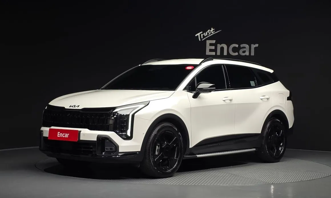 Kia Sportage — фото 1