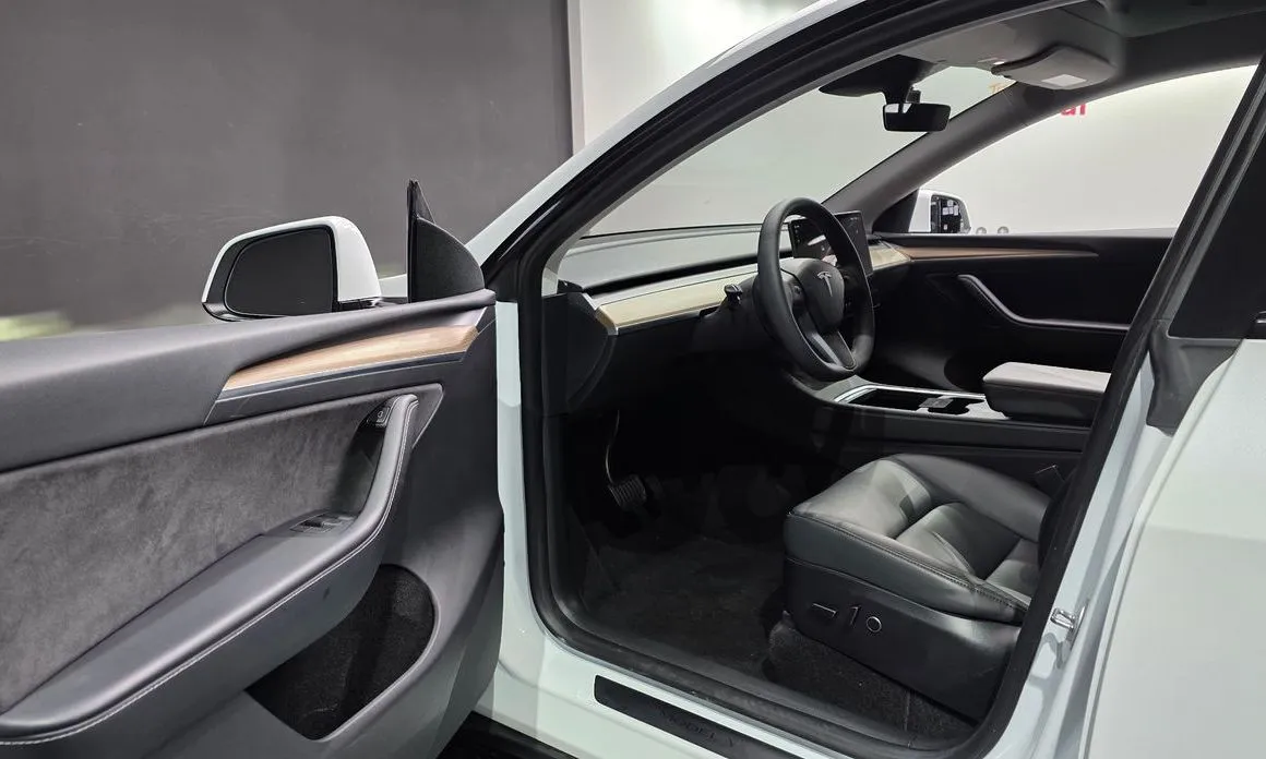 Tesla Model Y — фото 7