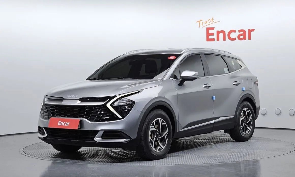 Kia Sportage — фото 1