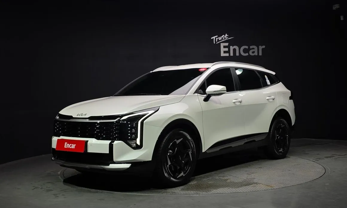 Kia Sportage — фото 1