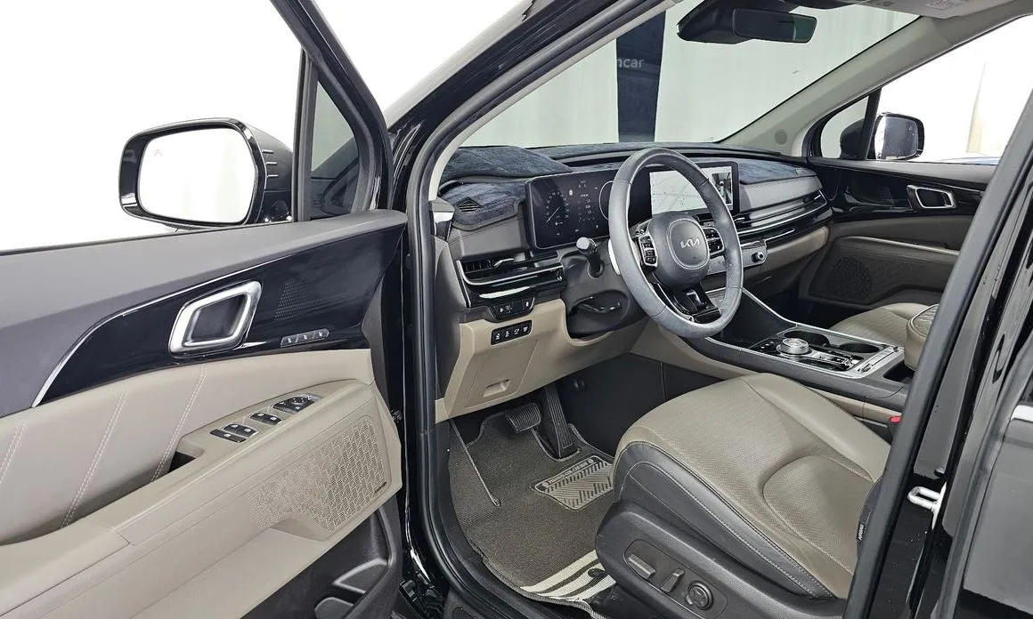 Kia Carnival — фото 10