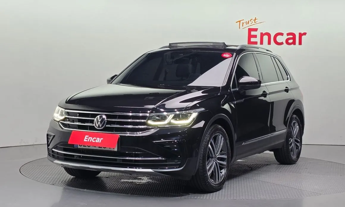 Volkswagen Tiguan — фото 1