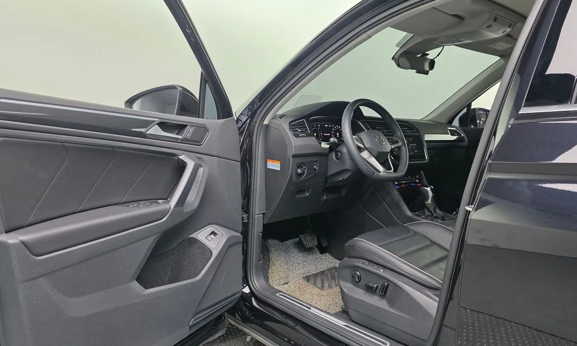 Volkswagen Tiguan — фото 6