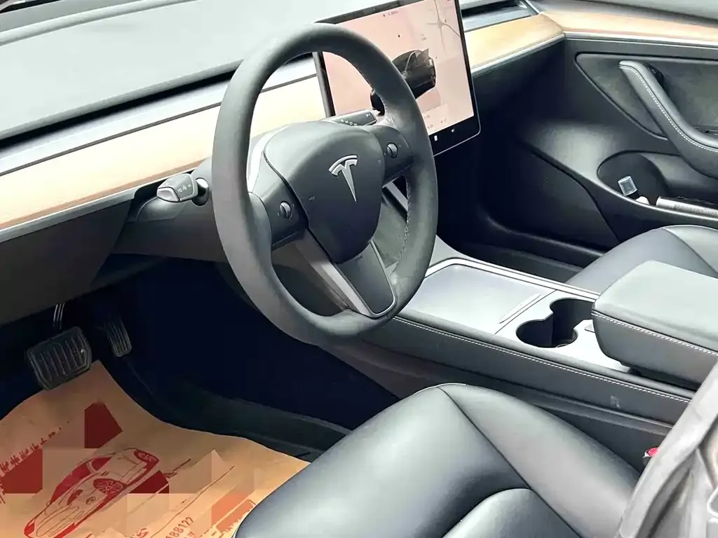Tesla Model 3 — фото 4