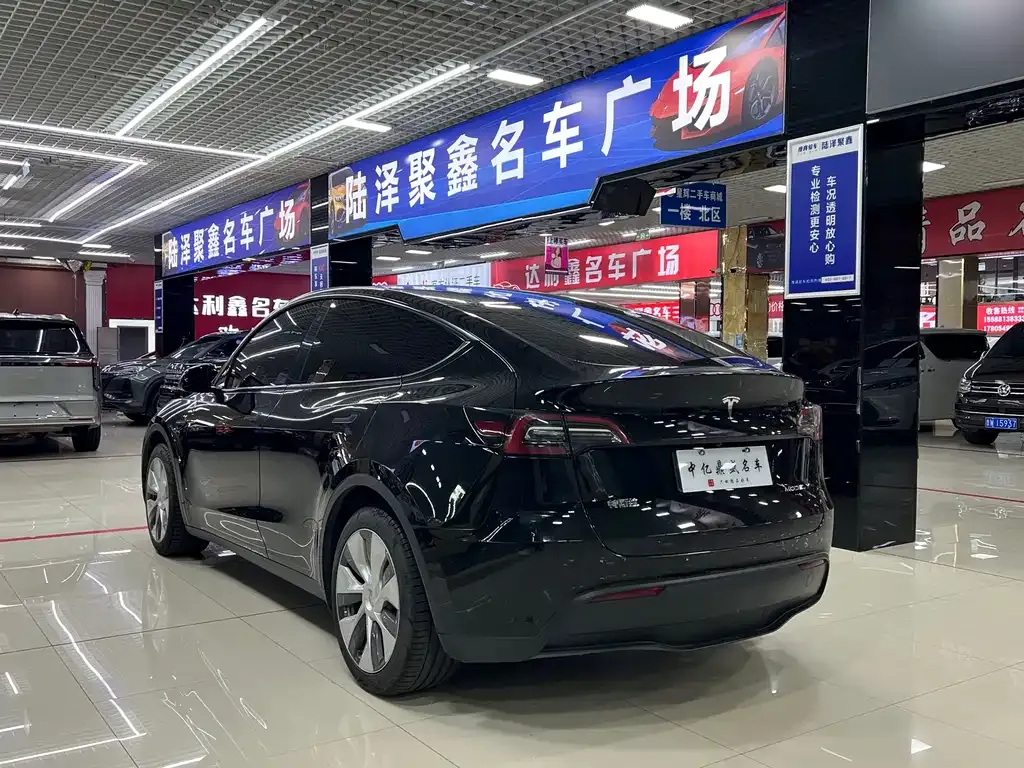 Tesla Model Y — фото 7