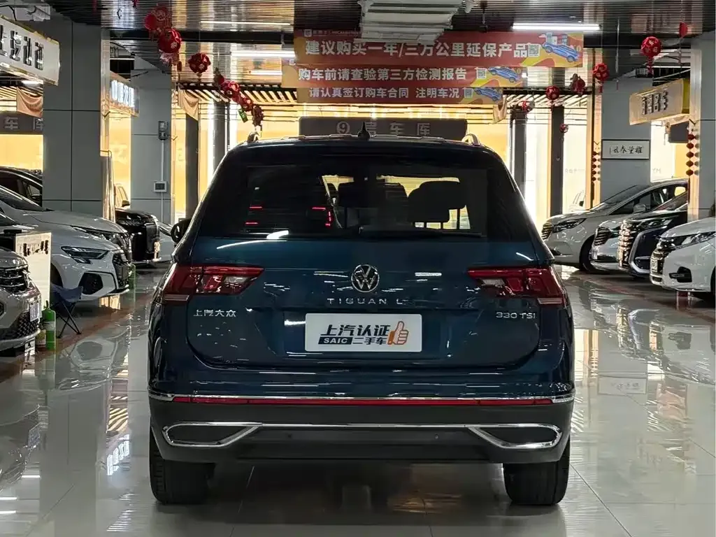 Volkswagen Tiguan L — фото 7