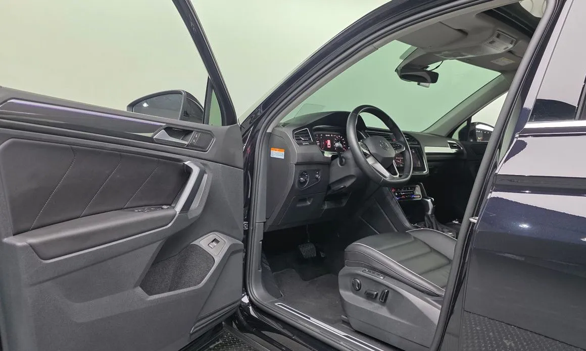 Volkswagen Tiguan — фото 8