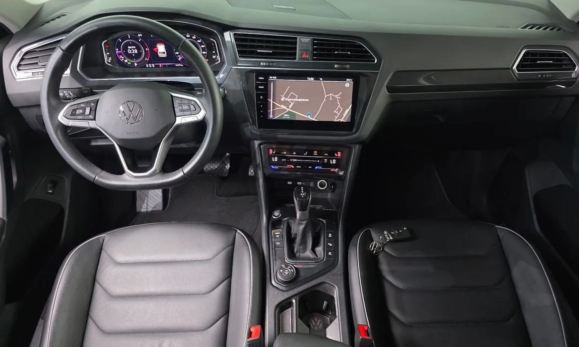 Volkswagen Tiguan — фото 10