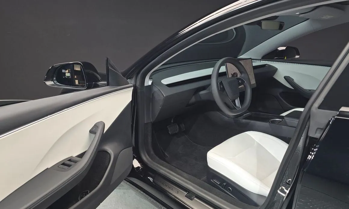 Tesla Model 3 — фото 9