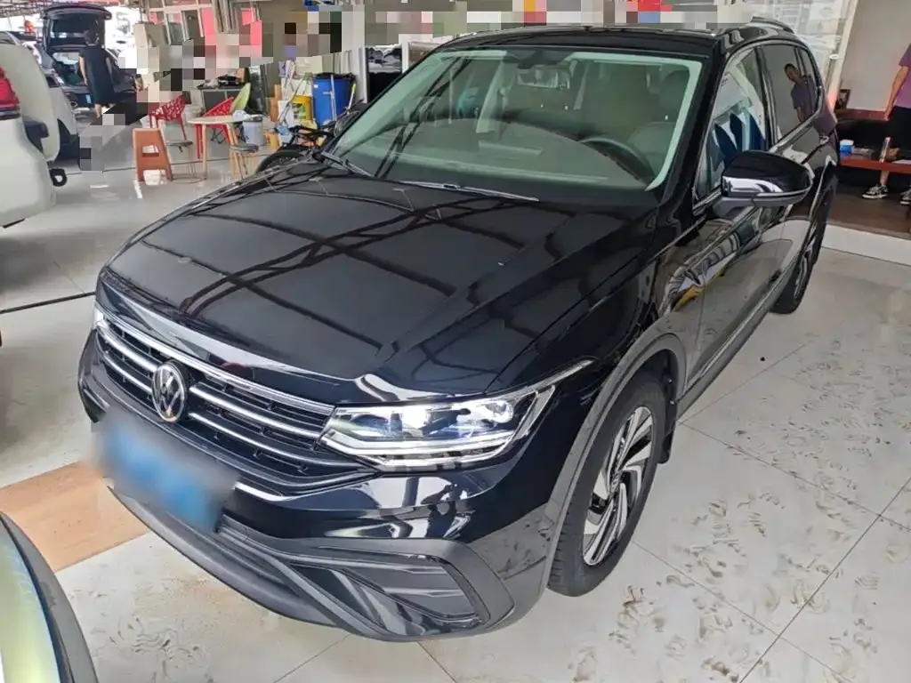 Volkswagen Tiguan L — фото 5