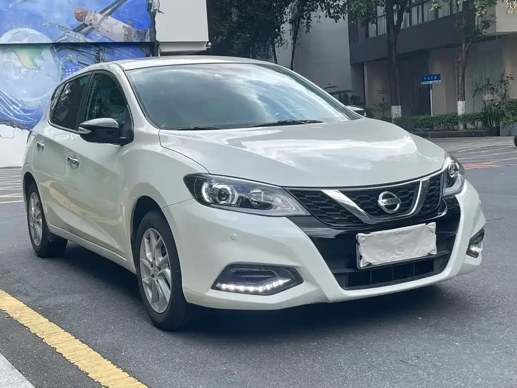 Nissan Tiida — фото 6