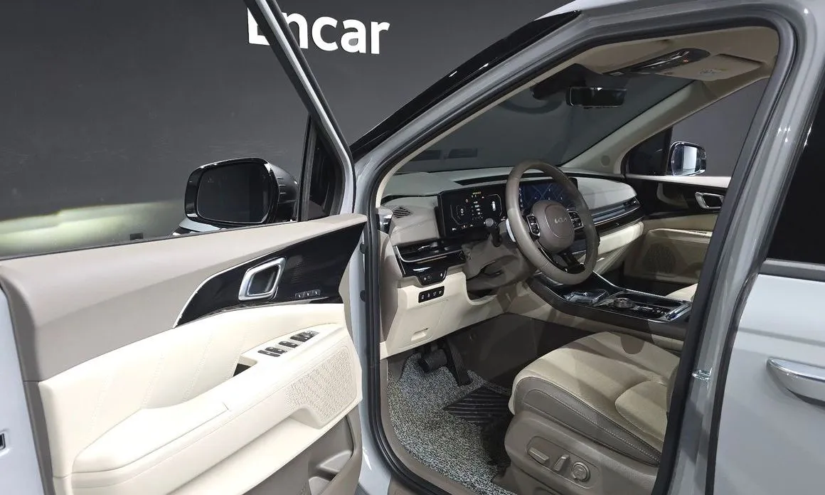 Kia Carnival — фото 10
