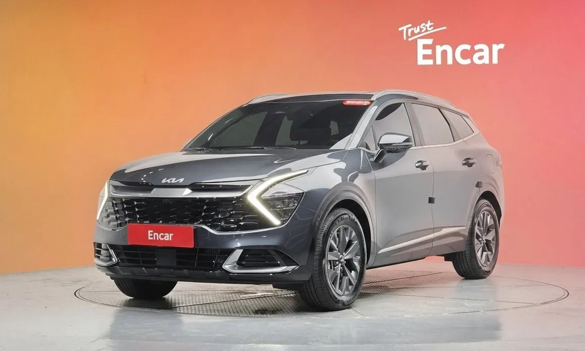 Kia Sportage — фото 1