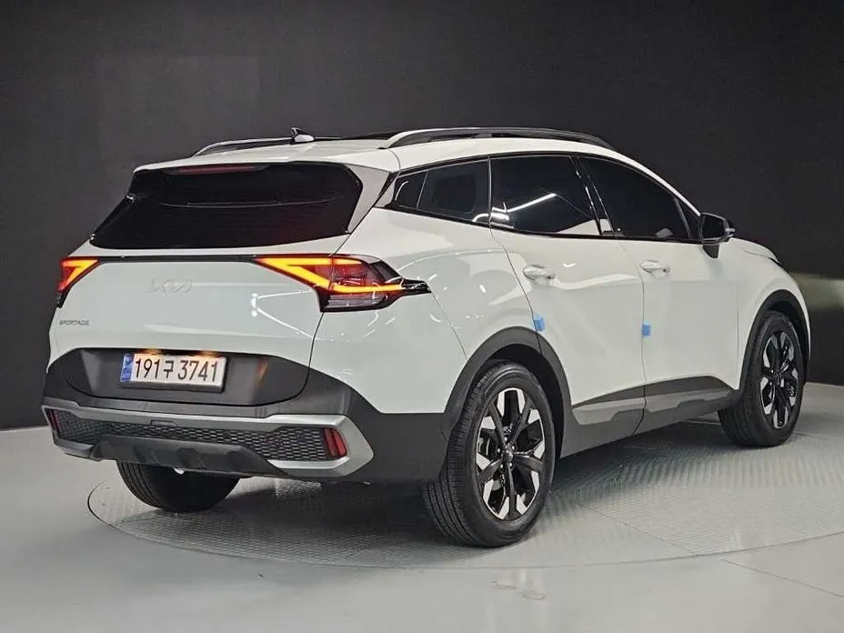 Kia Sportage — фото 7