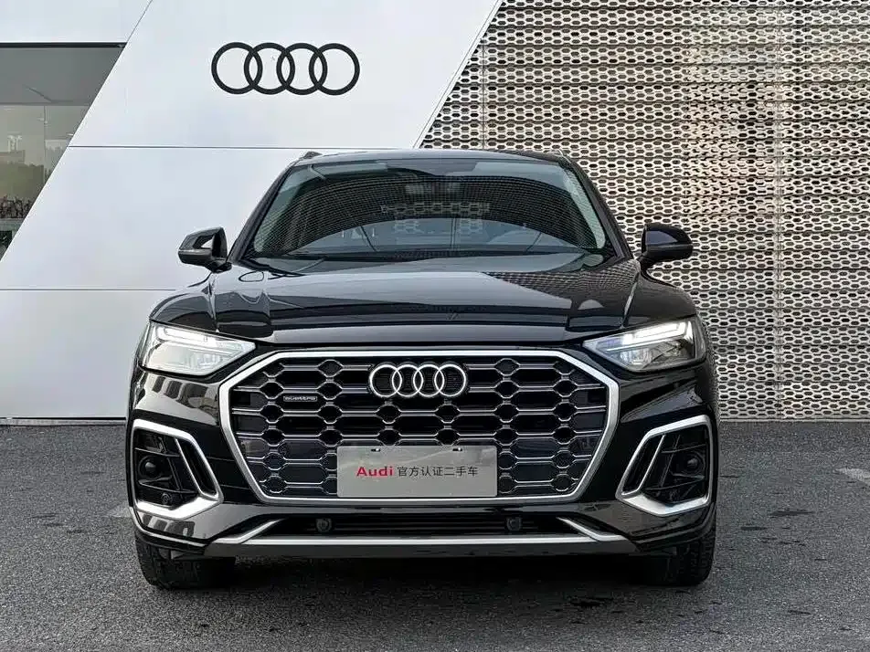 Audi Q5L — фото 9