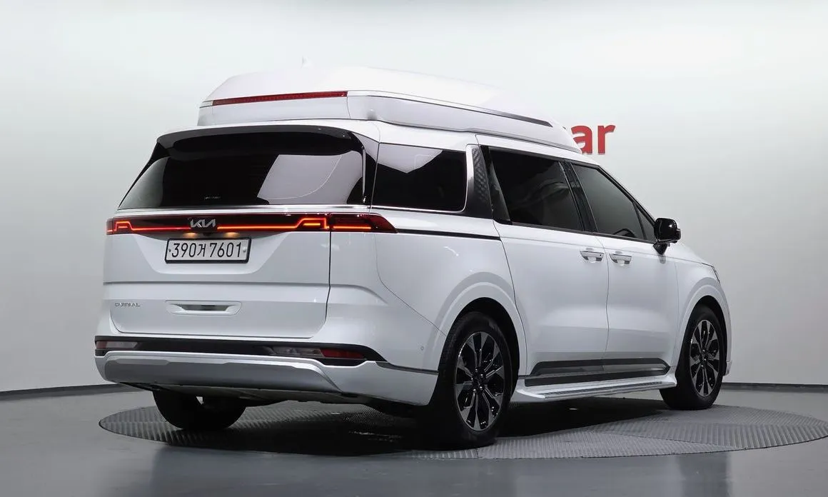 Kia Carnival — фото 10