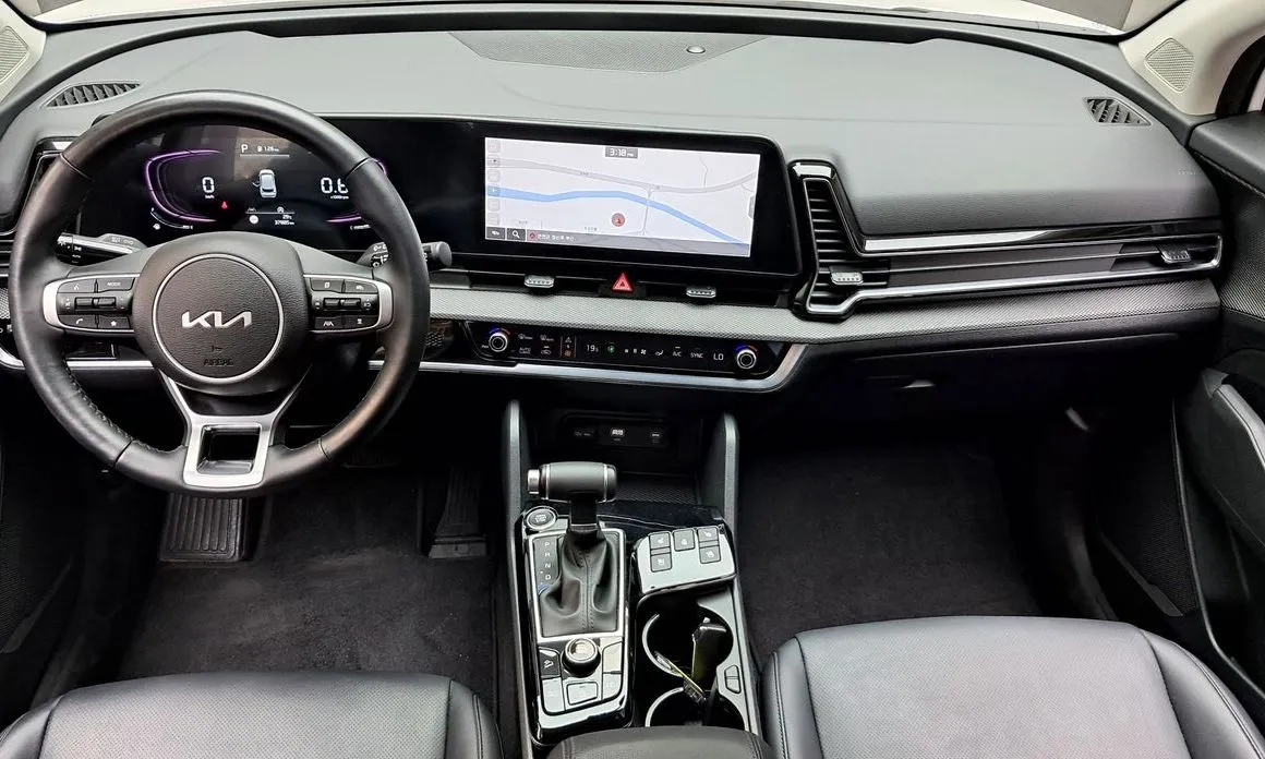 Kia Sportage — фото 9