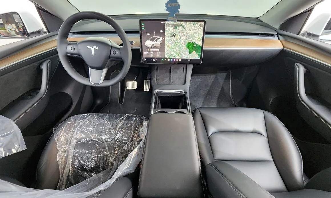 Tesla Model Y — фото 7