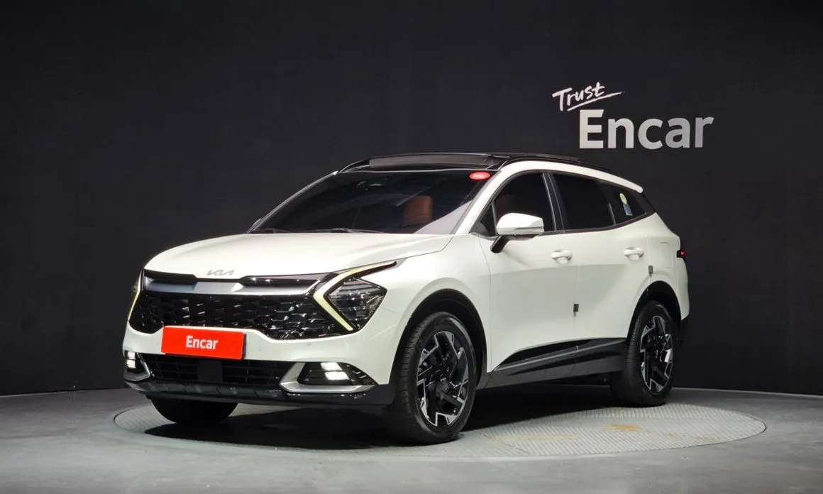 Kia Sportage — фото 1