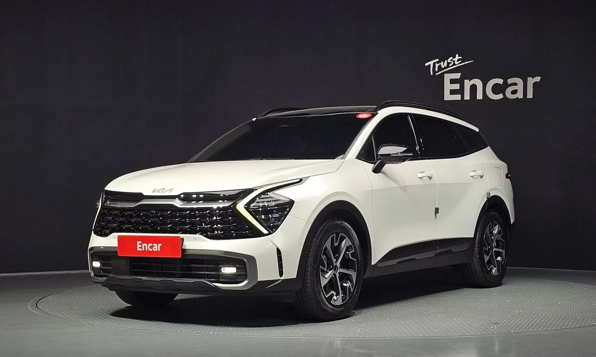 Kia Sportage — фото 1
