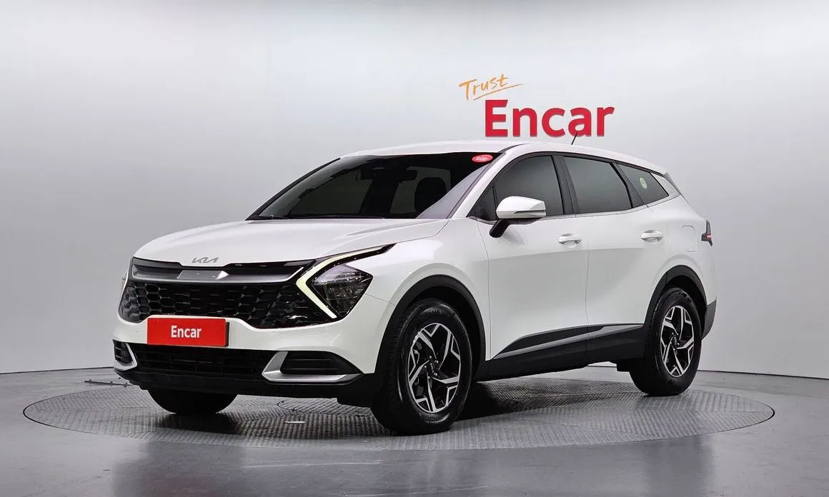 Kia Sportage — фото 1